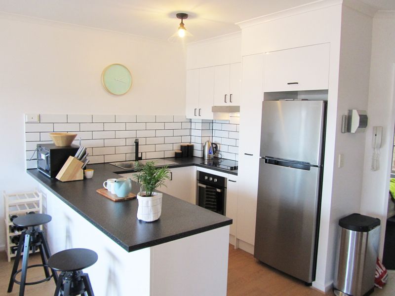 Secure, Renovated Modern Apartment with Great Views